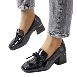 Black lacquered high-heeled shoes from Monisha