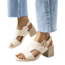 Beige sandals on the Lamia post