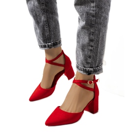 Red pumps on the low post of Florina
