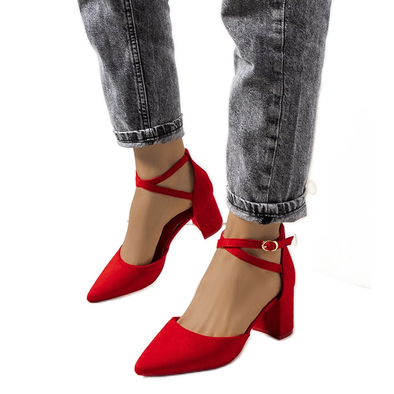 Red pumps on the low post of Florina