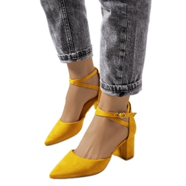 Mustard pumps on a low Florina post yellow