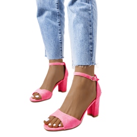 Neon pink sandals on the Polet post
