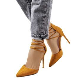 Brown leather heels with a Glover strap Brown leather heels with a Glover strap