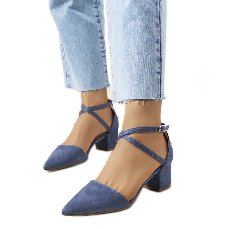 Blue pumps on the Hyde post