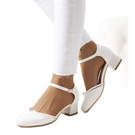 White pumps on a low post from Lynden