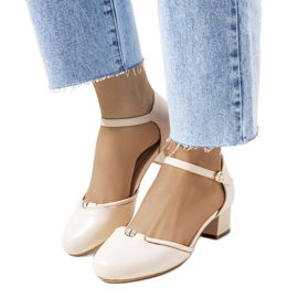 Beige pumps on a low Lynden post
