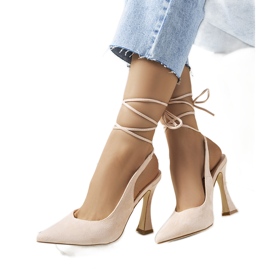 Beige lace-up pumps on the Lotti post Beige lace-up pumps on the Lotti post