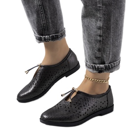 Black openwork shoes from Holm