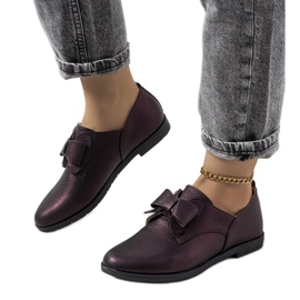 Brown brogues with a Korner bow
