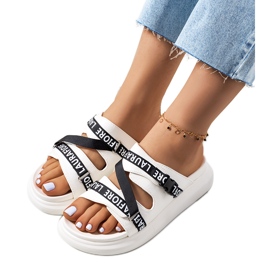 White slippers on the Kogil platform