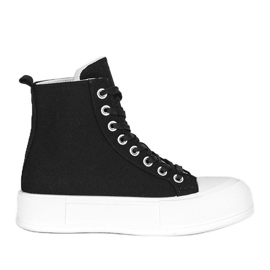 Black sneakers on a high Natasha sole