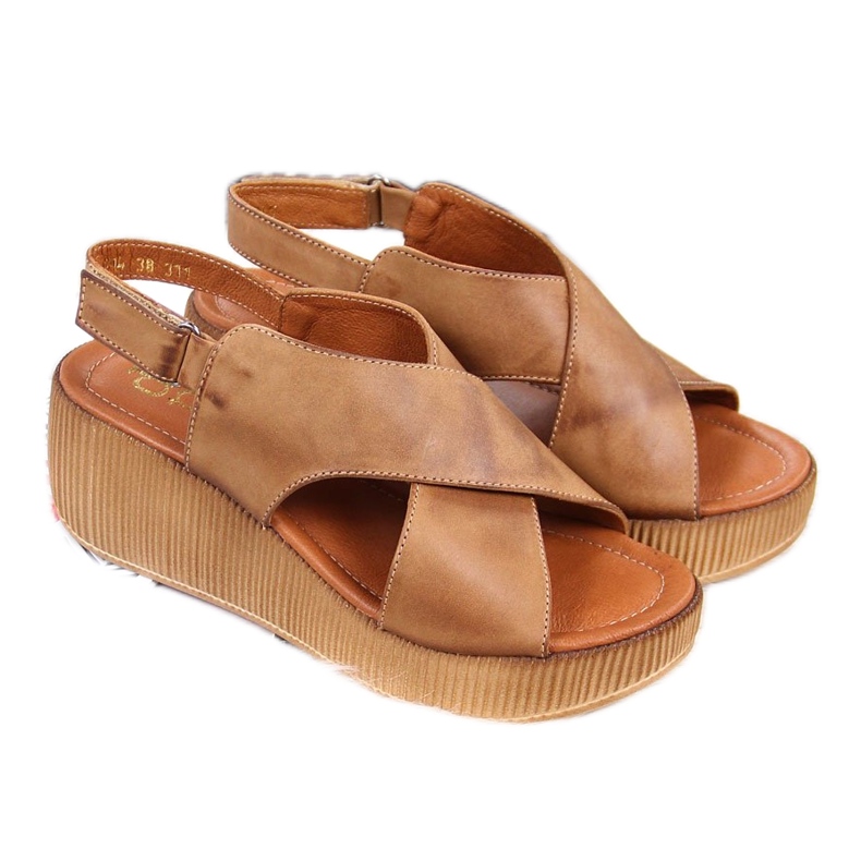 Women's leather sandals on a brown wedge Dolce Pietro