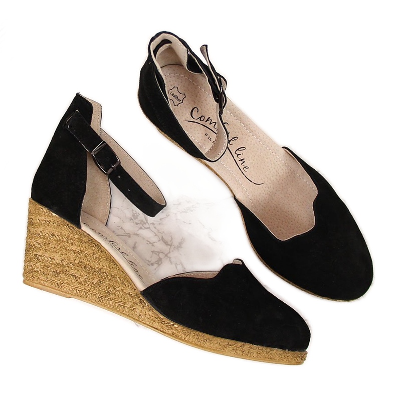 Leather women's sandals on a black wedge Filippo