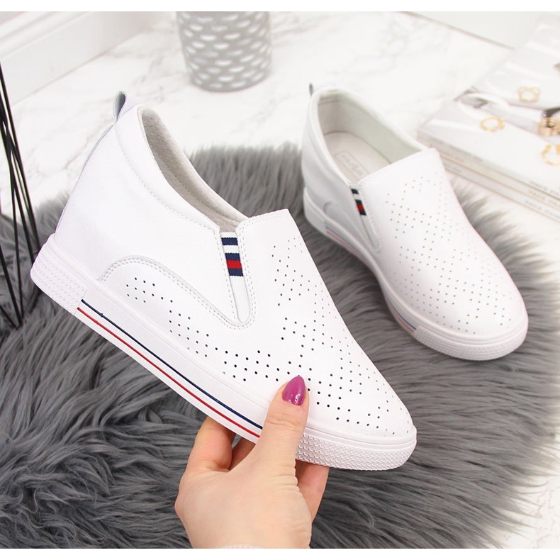 Women's leather sneakers on a white openwork wedge Filippo