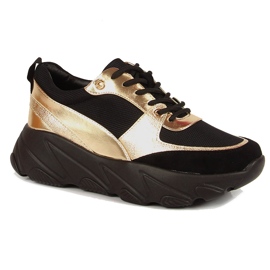 Women's sports shoes on the Potocki platform black golden