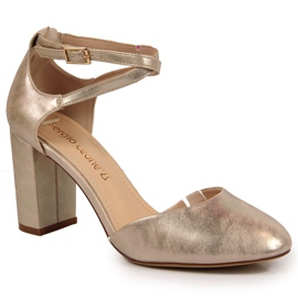 Women's sandals on the gold post by Sergio Leone golden