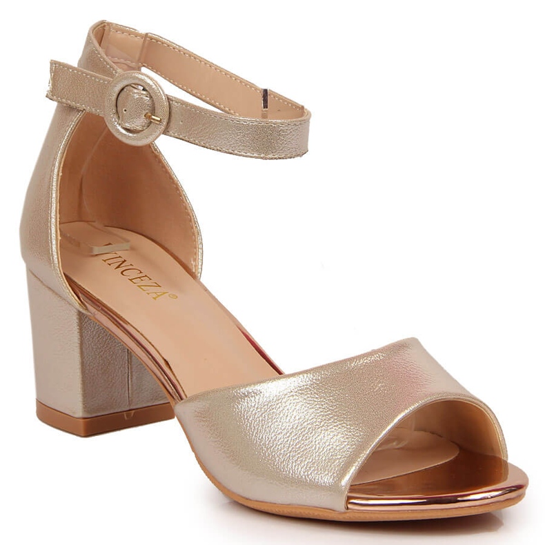 Golden Vinceza women's sandals on the post