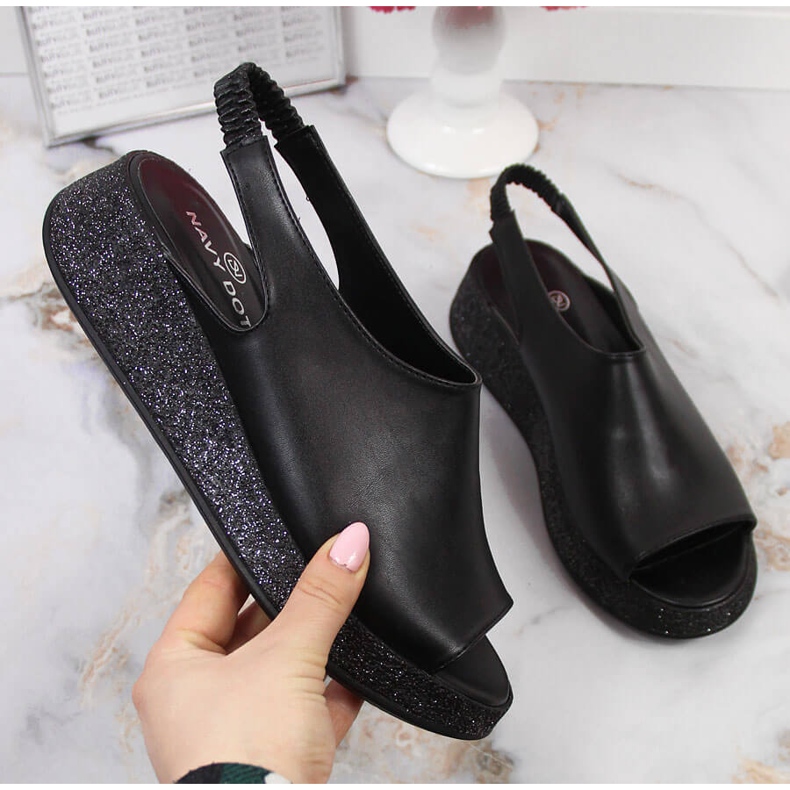 Women's black sandals on the Navy Dot platform