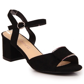 Black Sergio Leone sandals on the post