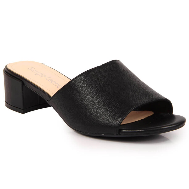 Women's black slippers on a block by Sergio Leone