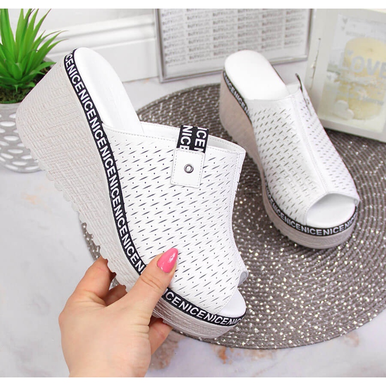 Women's leather slippers on a wedge white Artiker
