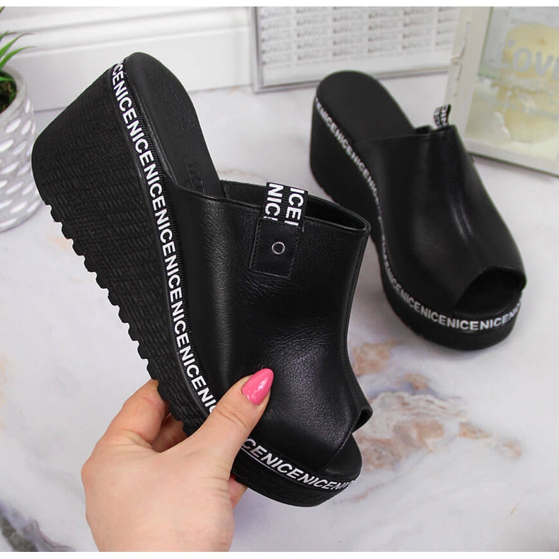 Women's leather slippers on a black Artiker wedge