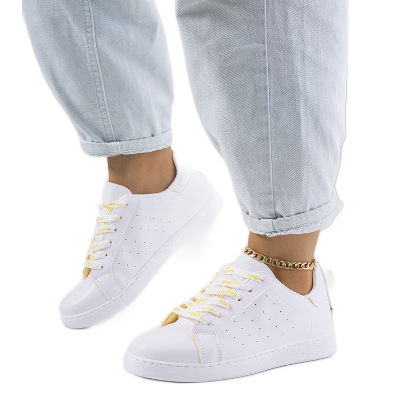 Koho white and yellow sports shoes Koho white and yellow sports shoes