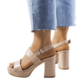 Beige sandals on the Liv post