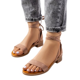 Beige lace-up sandals from Moody