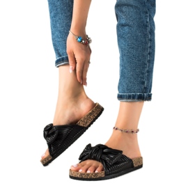Bestelle Stylish flip-flops with a bow black