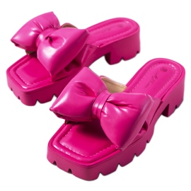 Pink slippers on the Platt tractor sole