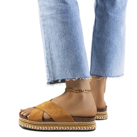 Brown slippers on the Muncho platform