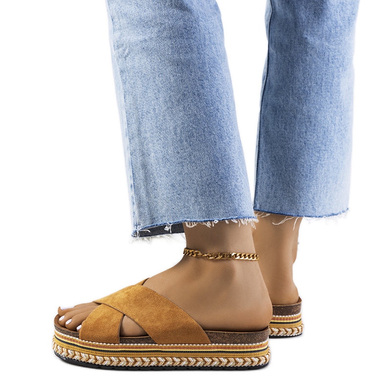 Brown slippers on the Muncho platform