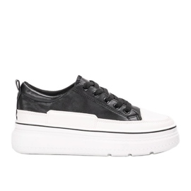 Black sneakers on the Anastaz platform white
