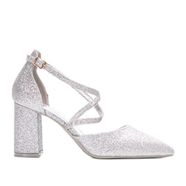 Silver glitter pumps on the Backer post