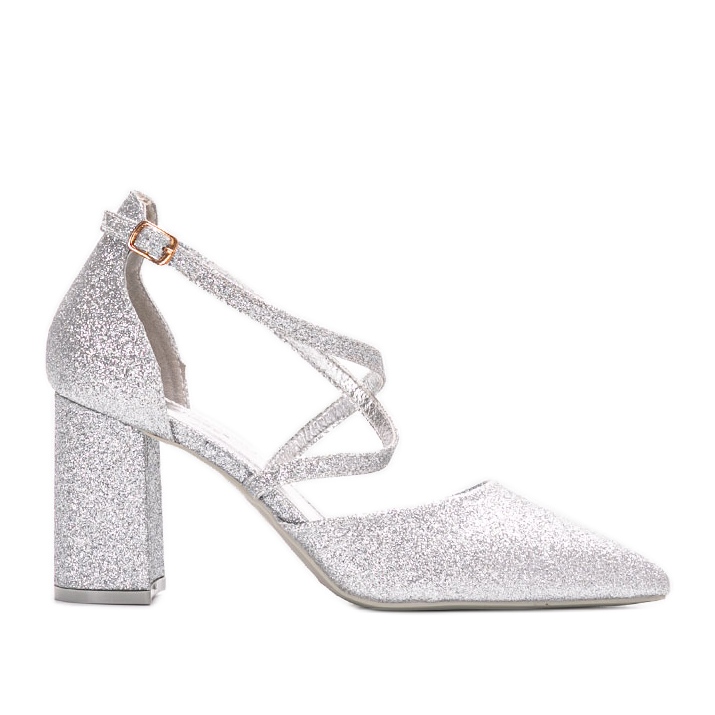 Silver glitter pumps on the Backer post