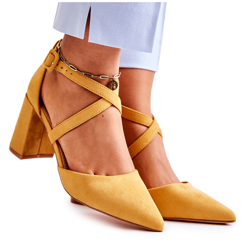 FB1 Fashionable Sandals On A Yellow Sinari Bar