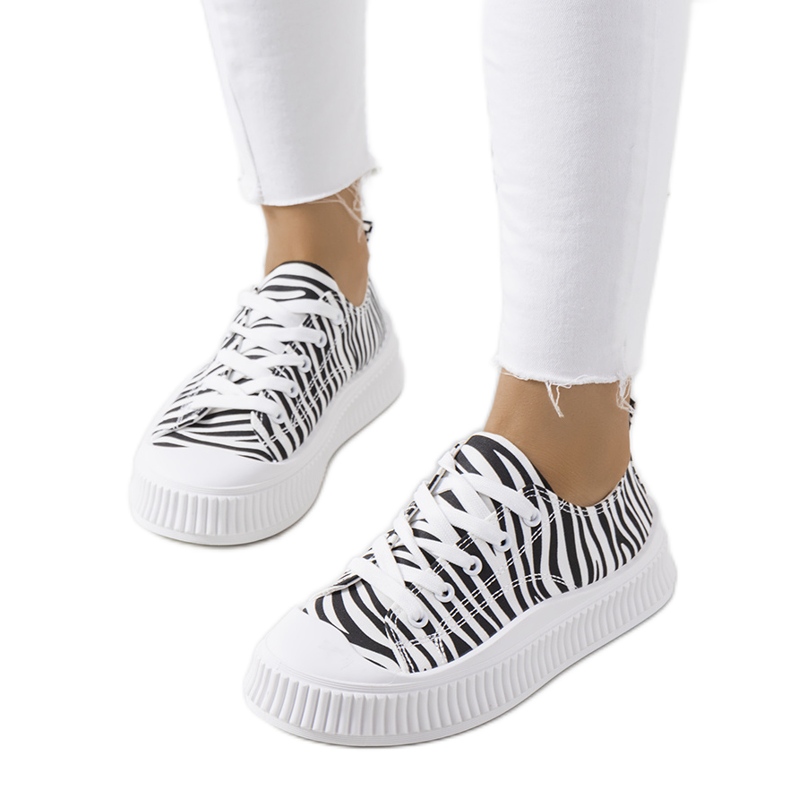 Black and white sneakers on the Chovka platform