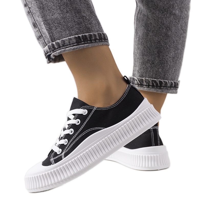 Black sneakers on the Chovka platform