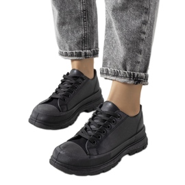 Black sneakers on a thick Nurbik sole Black sneakers on a thick Nurbik sole