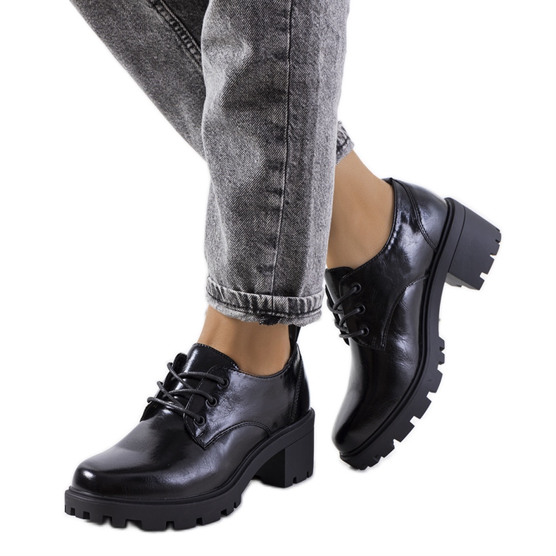 Black high-heeled shoes from Vance