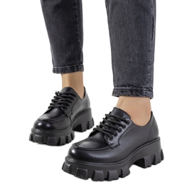 Black shoes on a Massey trapper sole