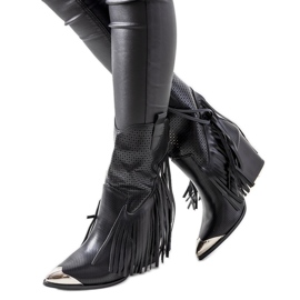 Wando's black cowboy boots