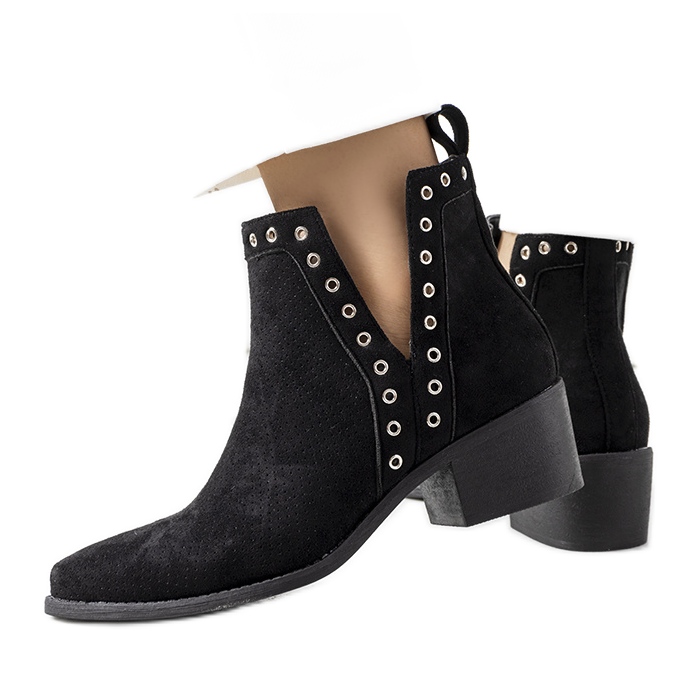 Black boots with cutouts from Tyas