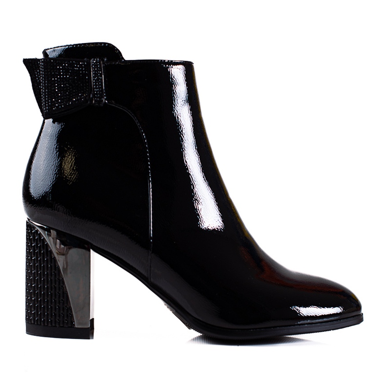 Elegant women's Shelovet boots on a decorative black post Elegant women's Shelovet boots on a decorative black post