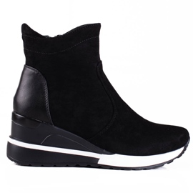 Vinceza women's sports boots on a black platform