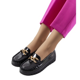 Black loafers on the Travessa platform Black loafers on the Travessa platform