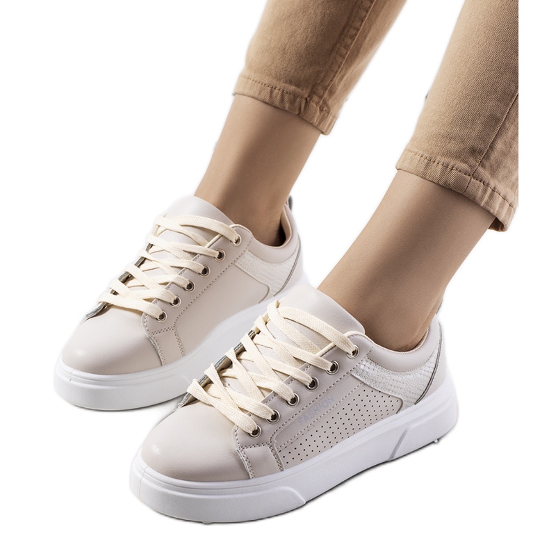 Beige sneakers with a thick Louisiana sole
