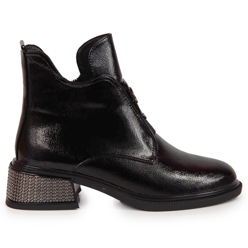 Black Filippo women's boots on a decorative block