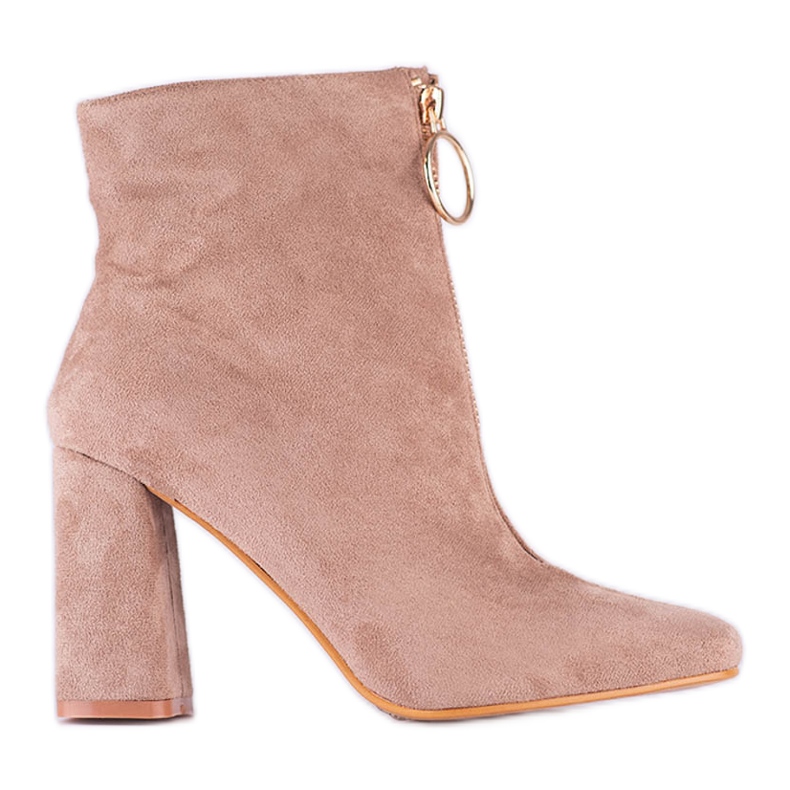 Ladies' beige boots on the Shelovet post with a golden zipper